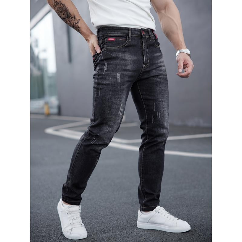 Mens Ripped Denim Jeans With Cat-Whisker Scratches