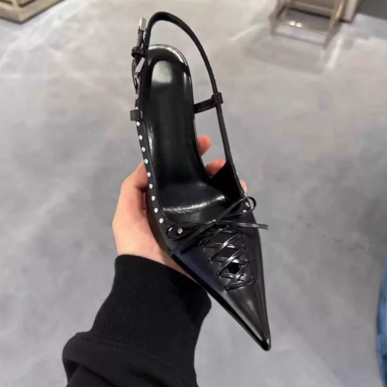 Pointed-toe Rivet-backed Stiletto Heels With A Thin Heel And Lace-up Design