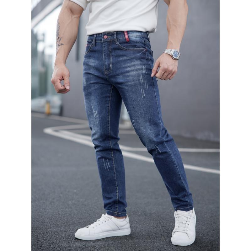 Mens Ripped Denim Jeans With Cat-Whisker Scratches